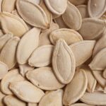 Semente de abobora com casca crua à granel - Imagem 2